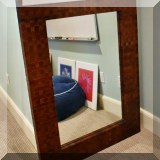 DM01. Mirror with woven leather frame. 48”h x 36”w 